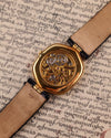 Rear view of Audemars Piguet skeleton watch with sapphire case back revealing engraved movement architecture