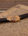 Crown-side view of Audemars Piguet 18K gold skeleton watch highlighting case shape and crown design