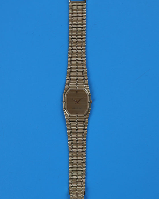 Audemars Piguet Bamboo 27mm watch in solid 18K yellow gold with ribbed dial and integrated bracelet, c. 1990