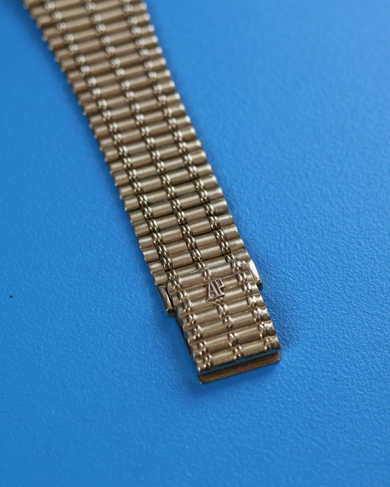 Integrated 19cm 18K yellow gold bracelet on Audemars Piguet Bamboo, featuring bamboo-textured links