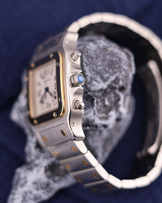 Side view of Cartier Santos Chronograph showing blue cabochon crown and mushroom-style pushers