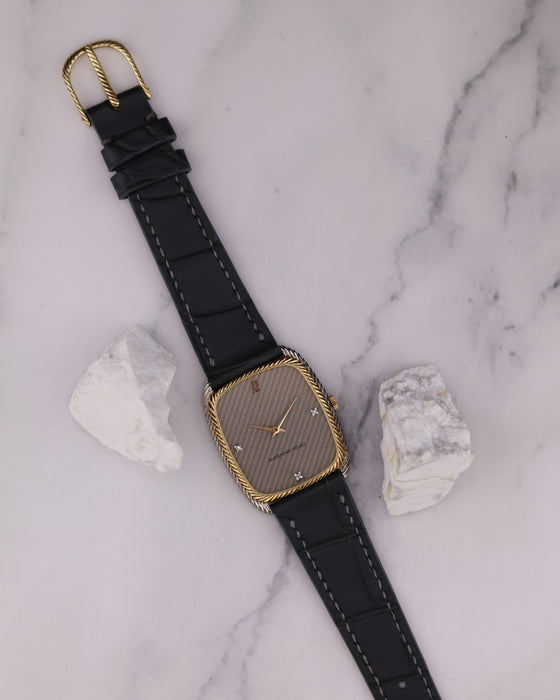 Audemars Piguet two-tone vintage dress watch with 18K yellow and white gold case, braided bezel, and diamond markers, c. 1970s