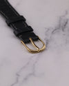 Top view of original 18K yellow gold Audemars Piguet buckle with braided motif matching watch bezel