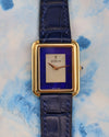 Close-up of Corum stepped bezel tank dial showcasing the luminous mother-of-pearl center and deep blue lapis lazuli surround