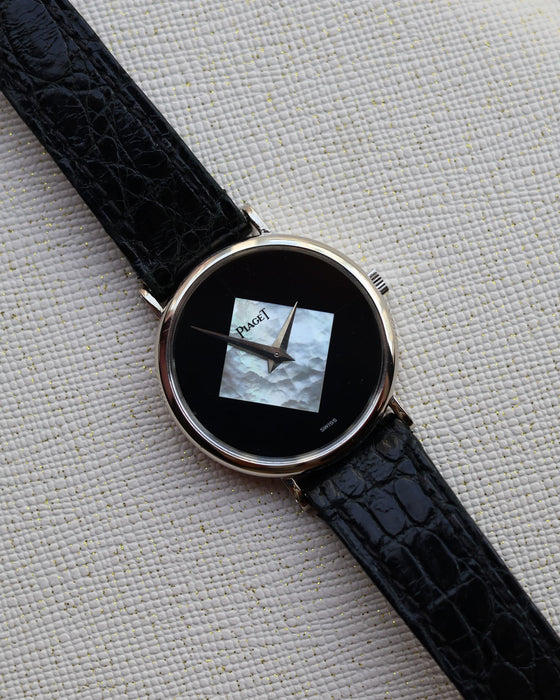 Full view of the Piaget Ref. 922 vintage dress watch in 18K white gold, shown with original black alligator strap and minimalist Art Deco-inspired dial.