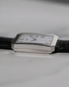 Profile view of Piaget Ref. 26354 highlighting slim case, fluted sides, and integrated lugs.