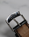 Underside of original Piaget 18K white gold buckle showing hallmark and clasp construction.
