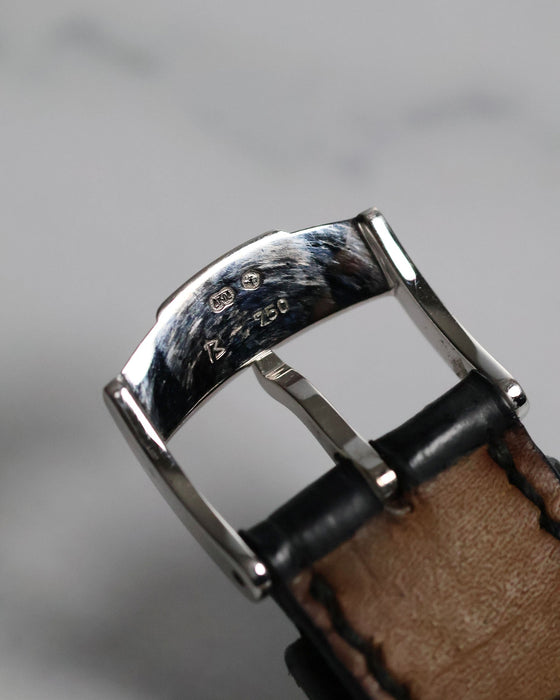 Underside of original Piaget 18K white gold buckle showing hallmark and clasp construction.