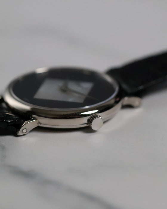 Detailed view of the Piaget Ref. 922 crown integrated into the slim 18K white gold case.
