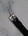 Top view of the original Piaget 18K white gold buckle engraved with the Piaget logo.