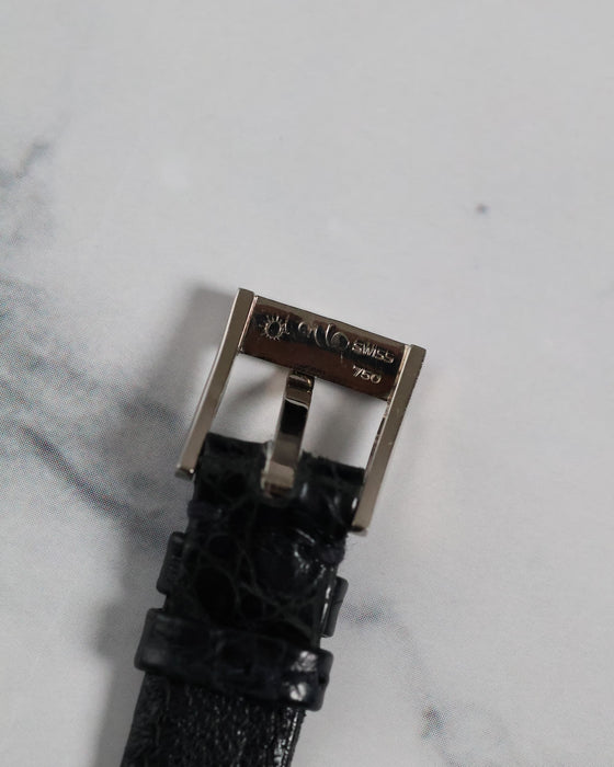 Underside view of the original Piaget white gold buckle, showing hallmarks and construction detail.