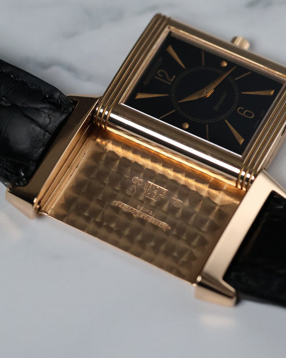 Jaeger-LeCoultre Reverso 250.2.86 shown mid-flip, displaying the iconic reversible case design.