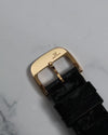 Top view of the original Jaeger-LeCoultre 18K rose gold buckle with engraved logo.