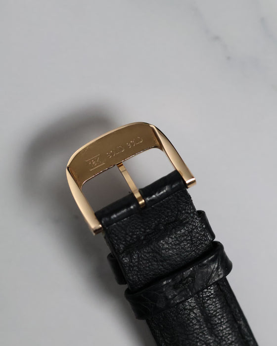 Underside of the Reverso’s 18K rose gold buckle showing hallmarks and original clasp mechanism.