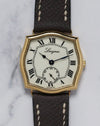 Front view of the 1970s Longines watch with distinctive Sympathie-style gold-plated case and Roman numeral dial.