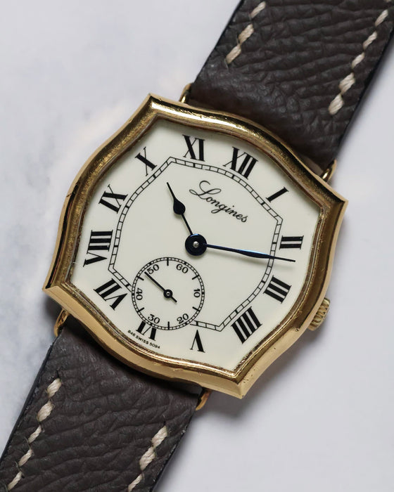 Angled overview of the Longines Sympathie-style watch showcasing its sculptural lugs and elegant proportions.