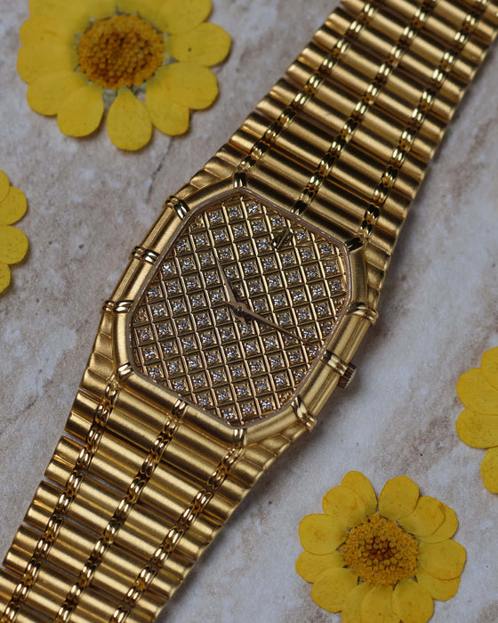 Audemars Piguet Bamboo 27mm watch with pavé diamond dial and 18K yellow gold bracelet – front view.