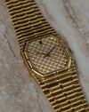 Elegant wristwatch view of the Audemars Piguet Bamboo 27mm in 18K yellow gold with diamond-set dial.