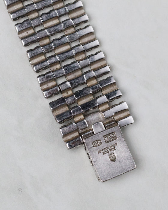 Close-up of the inside clasp showing Audemars Piguet engravings and gold hallmarks.