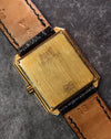 Caseback of Piaget Protocole 90154 in solid 18K yellow gold, showcasing vintage finish.