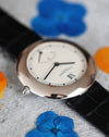 Chaumet Ref. 12A crown detail in white gold with sapphire crystal edge visible.