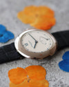 Slim profile of Chaumet Dress Watch Ref. 12A in 18K white gold, side view.