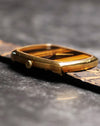 Detailed shot of the solid 18K yellow gold crown of the Piaget Ref. 9741