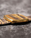 Side profile view showcasing the slim 18K yellow gold case of the Piaget 9741 dress watch