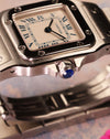 Cartier Santos Galbée Ref. 1565 close-up of crown with signature blue cabochon