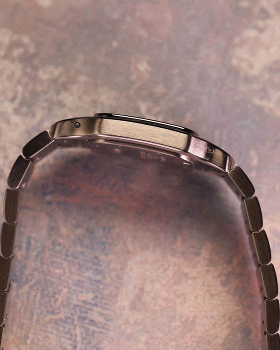 Cartier Santos Galbée Ref. 1565 side profile displaying slim stainless steel case and bracelet integration