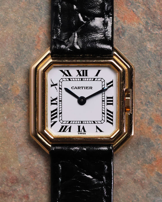 Cartier Ceinture 6602 square 18k gold case with sapphire cabochon crown and blued steel hands