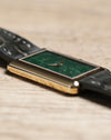 Slim profile of Piaget 9228 in 18k yellow gold case with leather strap