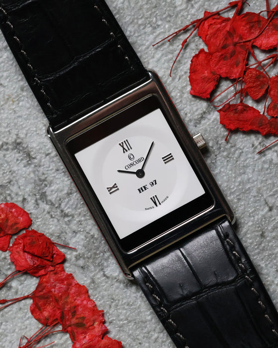 Front view of the Concord Delirium 1997 Hong Kong Limited Edition in platinum with ultra-thin rectangular case and Roman numeral dial.