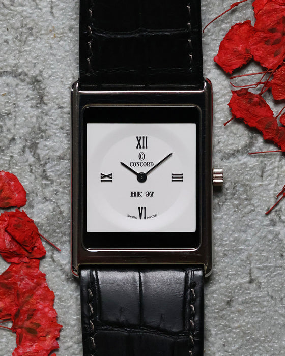 Angled shot of the Concord Delirium HK 97 Limited Edition showcasing its slim 4.1mm platinum profile on black alligator strap.
