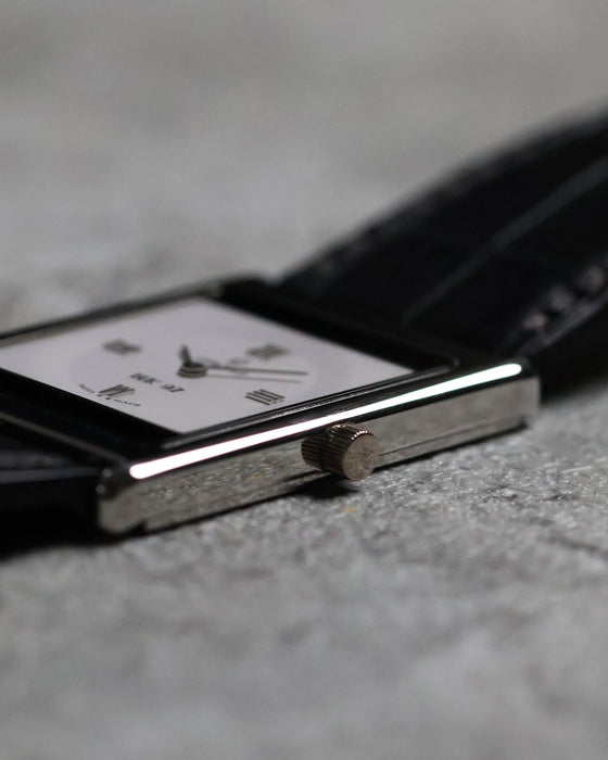 Detailed view of the polished crown on the Concord Delirium 1997 Limited Edition in platinum.
