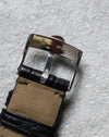 Underside of the Concord buckle showing refined finishing and clasp detail.