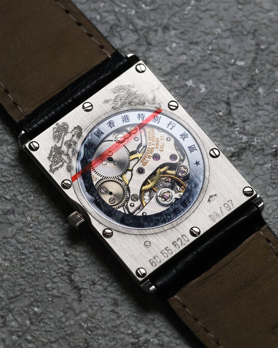 Macro shot of the transparent caseback showcasing the mechanical movement, a rare feature for Concord watches of this era.