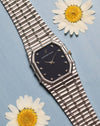 Audemars Piguet Bamboo 27mm in 18k white gold with dark blue matte dial and diamond hour markers, full view on integrated bracelet