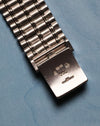 Underside of clasp on Audemars Piguet Bamboo 27mm showing gold hallmarks and engraved markings