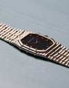 Side profile view of Audemars Piguet Bamboo 27mm white gold watch showing case thickness and bracelet integration