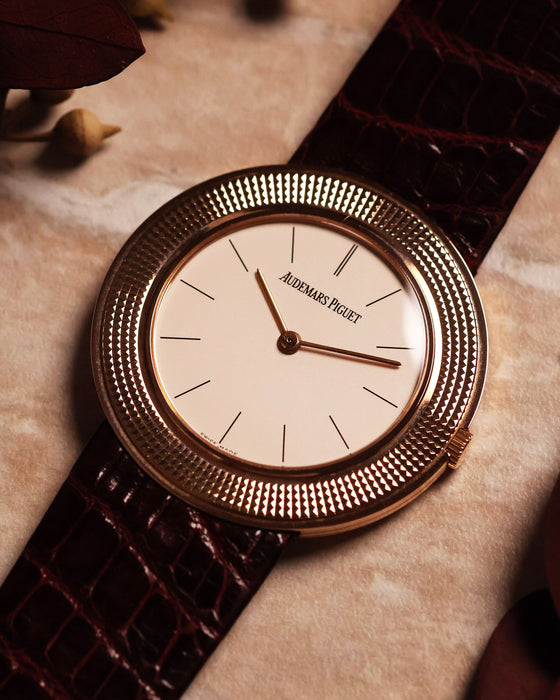 Complete Audemars Piguet Disco Volante in 18k rose gold with leather strap and original buckle, photographed upright