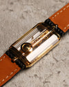Low-angle caseback shot of the Corum Golden Bridge 13150, highlighting the back-mounted crown and gold screws securing the sapphire crystal structure.