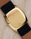 Solid gold caseback engraved with reference and serial numbers, displaying French hallmarks and brushed finishing.