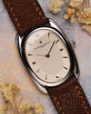 Vacheron Constantin Historiques 31110 in platinum – close-up of guilloché silver dial with applied pyramid and baton markers, showing the elongated oval case and brown textured leather strap.