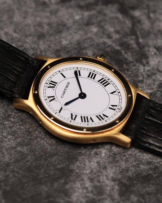 Low-angle view of the Cartier Arcade LM Ref. 9605 showing the thin case profile and polished bezel.