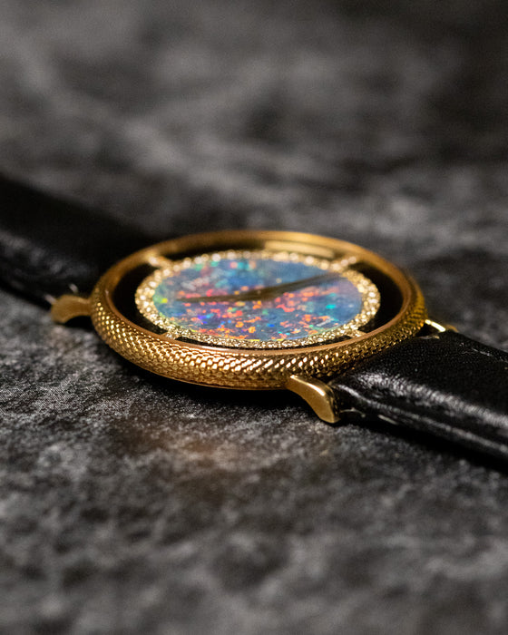 Low side view of Piaget Ref. 9026 emphasizing thin case profile and diamond-set inner bezel