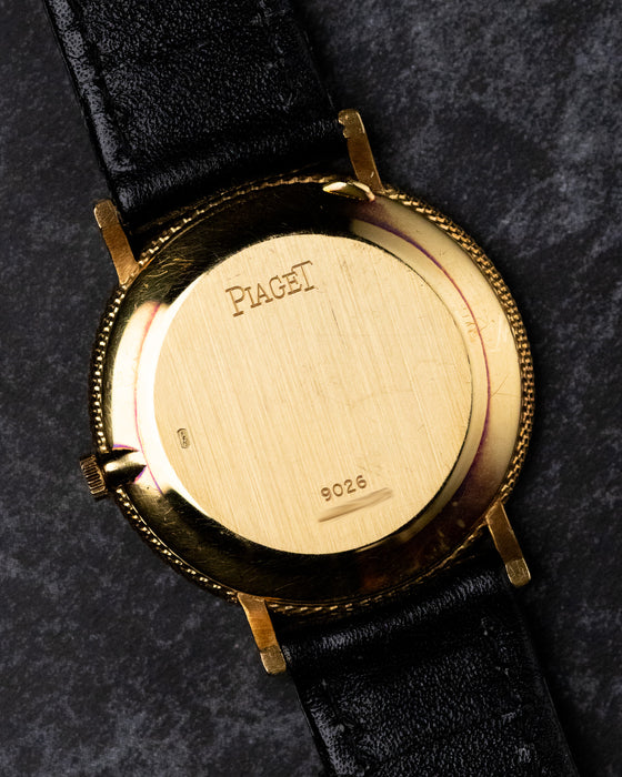 Caseback of Piaget Ref. 9026 in solid 18K yellow gold with Piaget signature and reference number 9026