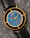 Final hero shot of Piaget Ref. 9026 opal dial watch with factory diamonds, onyx ring, and original gold buckle