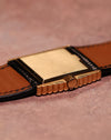 Close-up of the solid 18K yellow gold caseback on a Rolex Cellini Ref. 4015, displaying natural wear consistent with age and use.