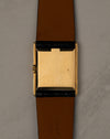 Caseback view of Rolex Cellini 4016 showing polished 18K yellow gold caseback with faint Rolex coronet and serial visible at angles